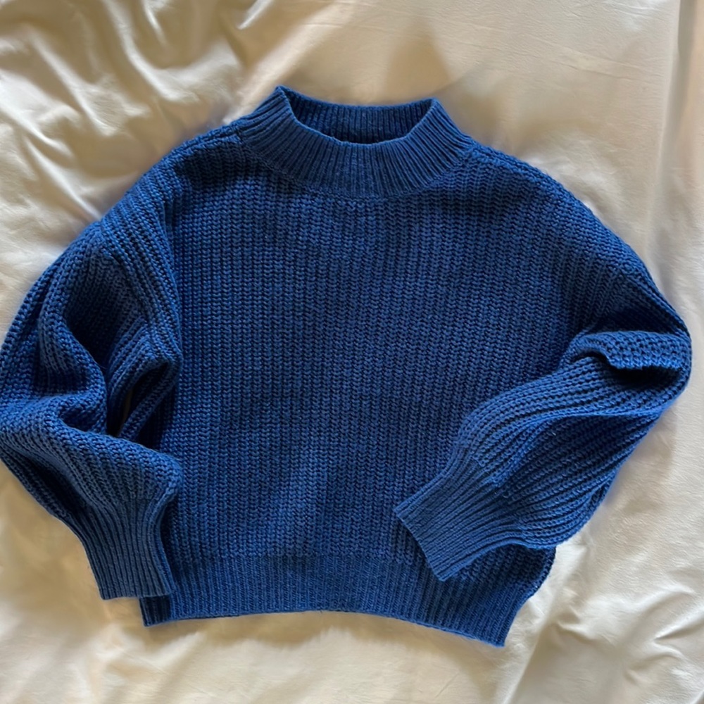 Like new soft royal blue sweater. Size Medium